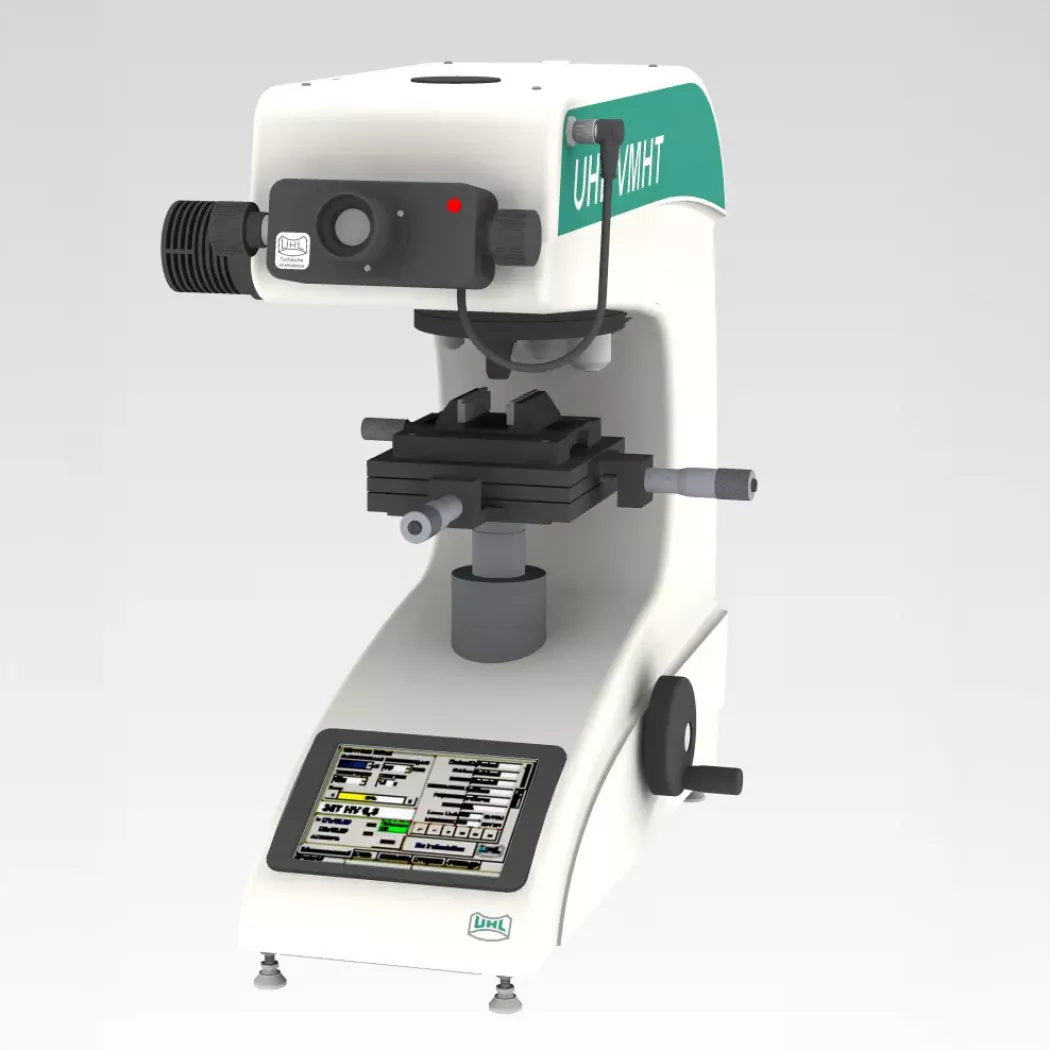 Mikrotwardościomierz Vickersa VMHT UHL – widok z&nbsp;przodu, stolik pomiarowy i&nbsp;pokrętła regulacji